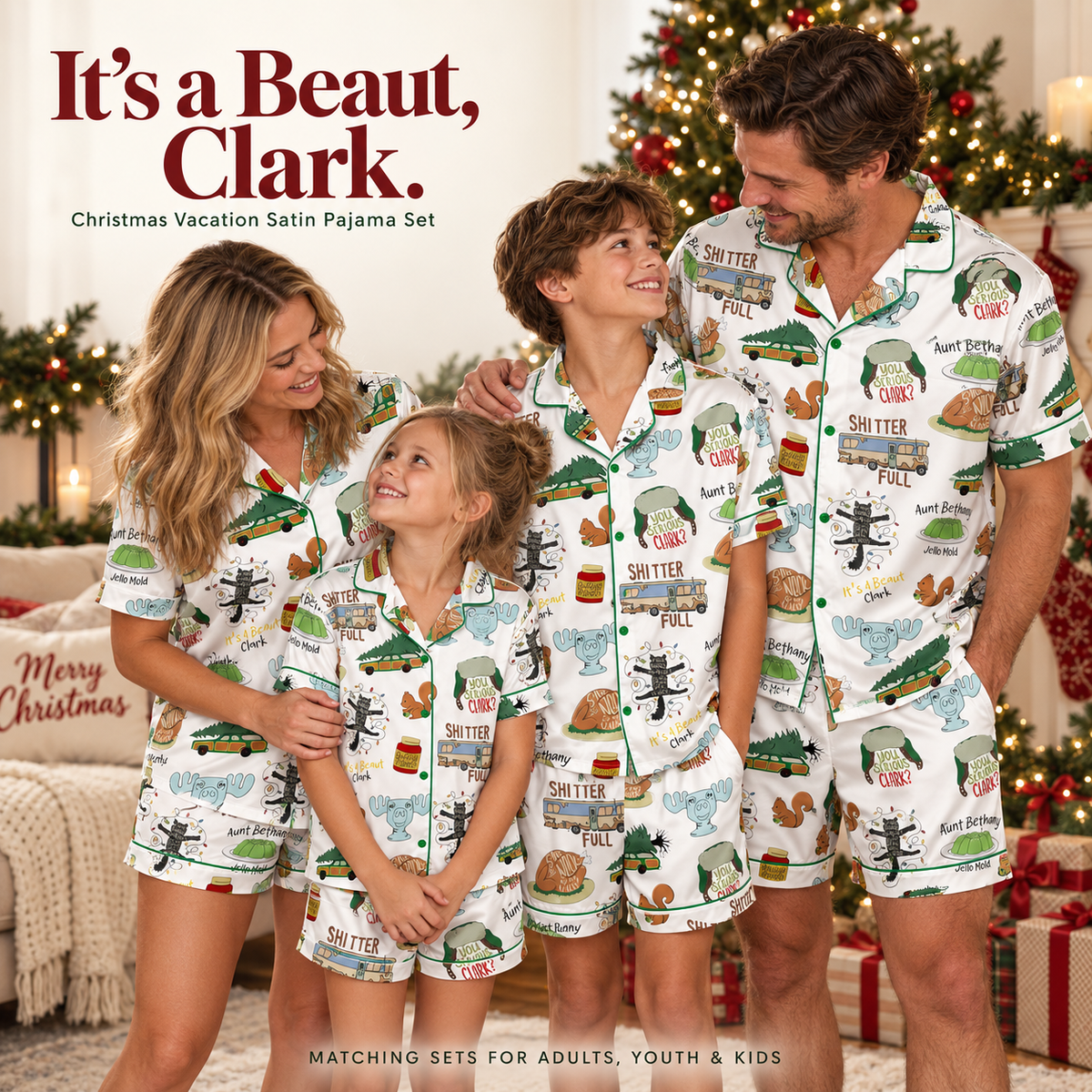 Family wearing matching Christmas Vacation satin pajama sets by the Christmas tree